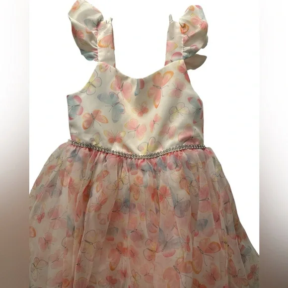 Beautiful ivory dress with a soft pastel butterfly print. - Picture 2 of 5